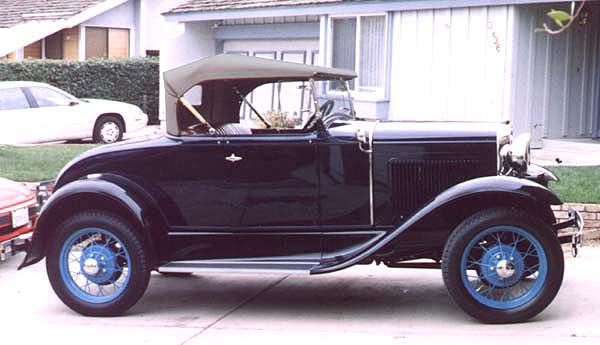 A simple right side view showing the absence of a side mounted spare tire.