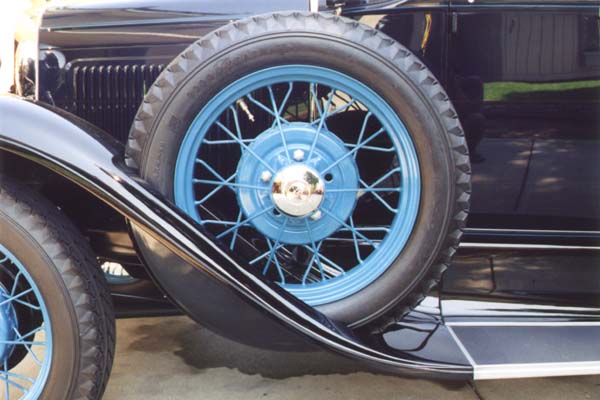 The side mounted spare was installed with the valve stem at either 11 o'clock or 1 o'clock.